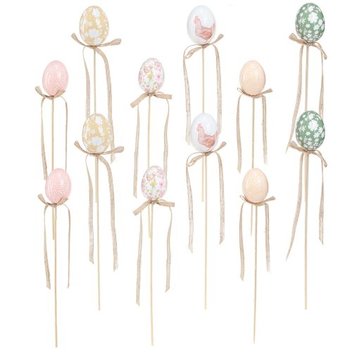Floristik24 Påskeegg på pinne dekorativ plugg påskekylling 4x5,5cm 12 stk