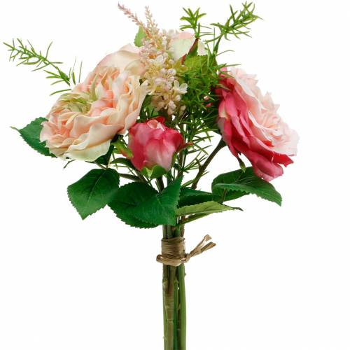 gjenstander Bukett med kunstige roser i en haug med rosa bukett av silkeblomster