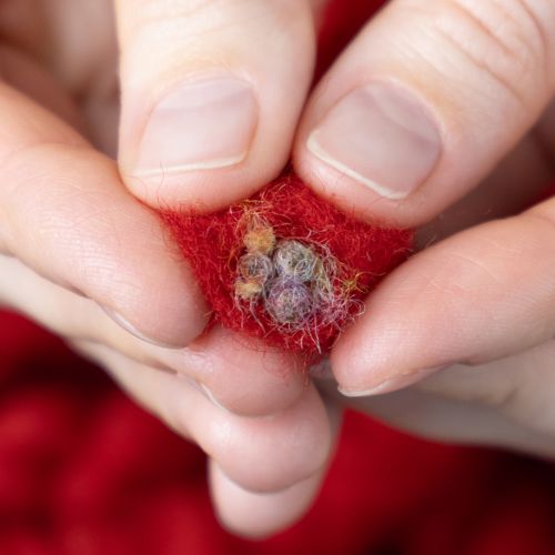 gjenstander Fluffy Mirabell ullsnor med jute, rød, 25m